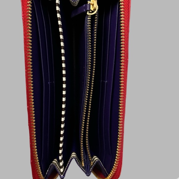 Henri Bendel red quilted wallet with a gold-tone logo. - Picture 11 of 16